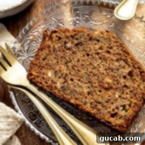 Zucchini Bread Perfection 14 Delicious Zucchini Bread loaf with a slice removed