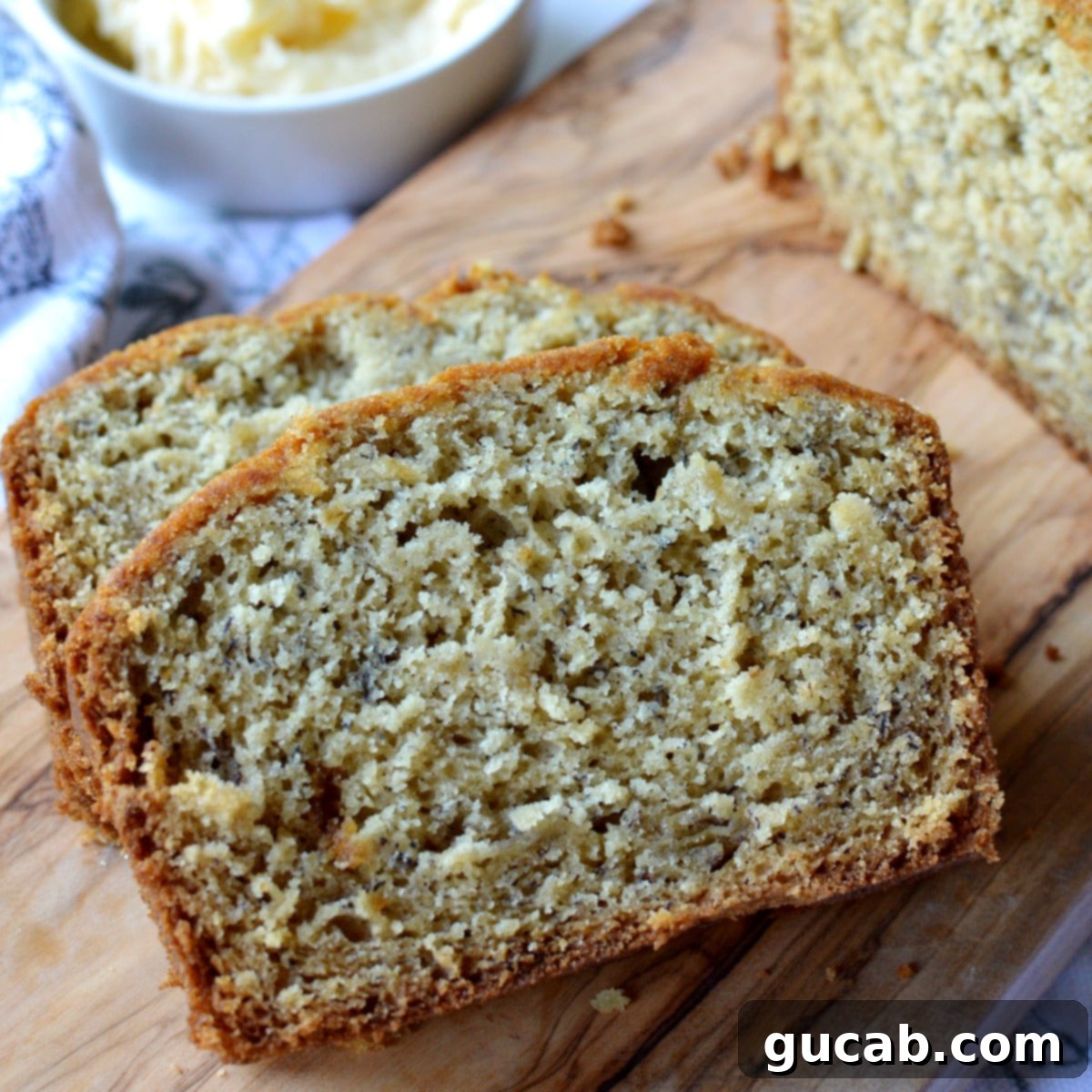 A beautifully baked loaf of gluten-free banana bread, perfectly golden brown.