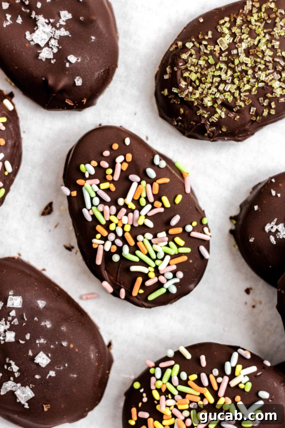 Homemade chocolate-covered peanut butter eggs, shaped like classic Easter candies.