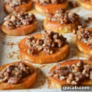 roasted sweet potato slices topped with candied pecans