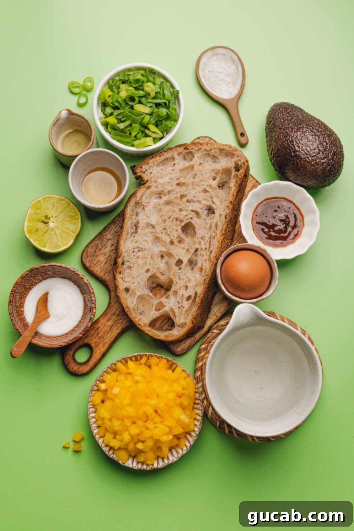 green onions, avocado, lime, sourdough bread, chipotle sauce, honey, yellow bell pepper, egg, salt, 