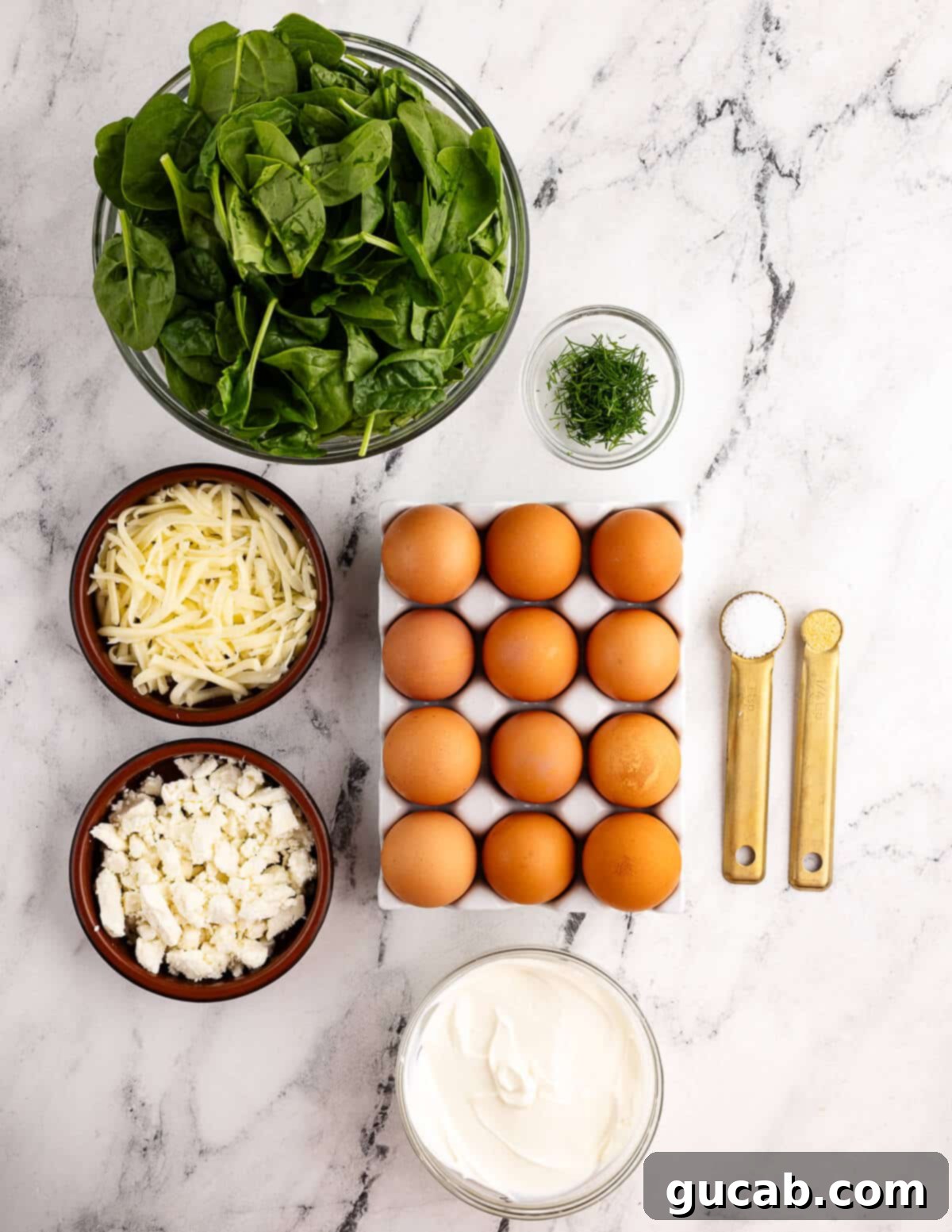 baby spinach, dill, eggs, feta, mozzarella, salt, sour cream, garlic powder. 