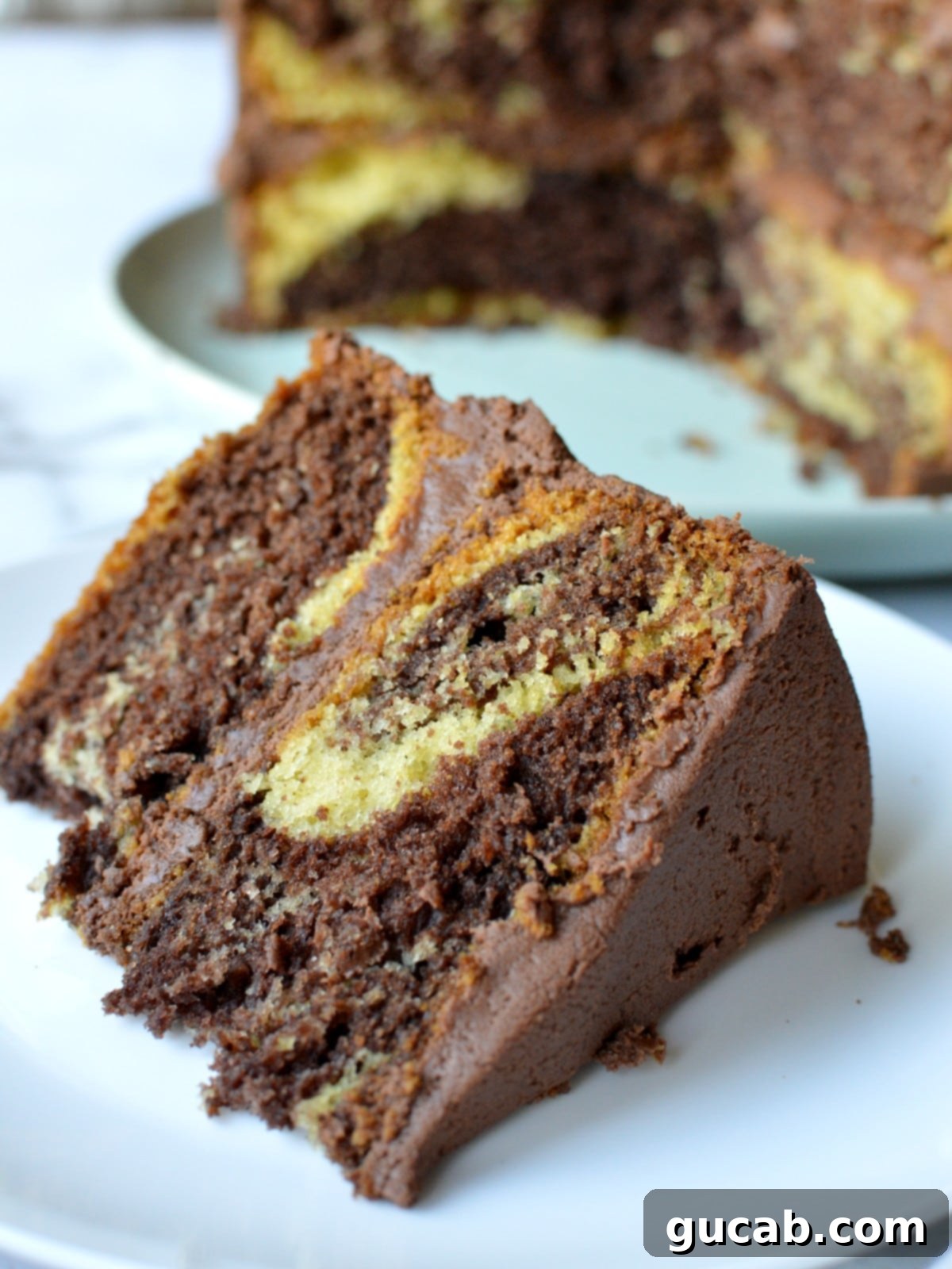 a slice of homemade marble cake on a plate