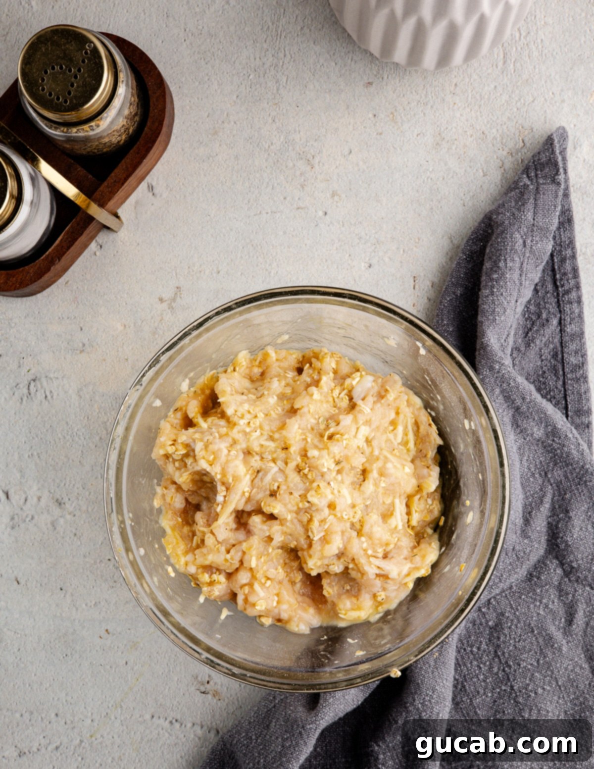 The Ultimate Date Night Chicken Meatballs 6 A bowl with the thoroughly mixed chicken meatball mixture, ready for scooping.
