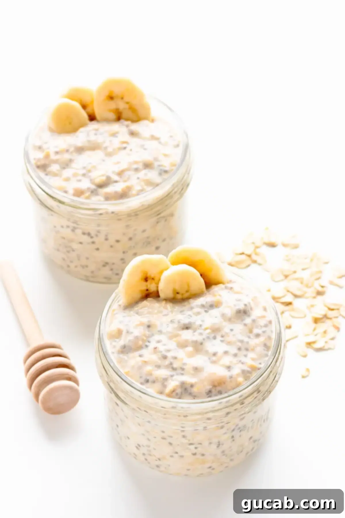 Multiple jars filled with creamy banana overnight oats, showcasing a convenient and nutritious make-ahead breakfast option.