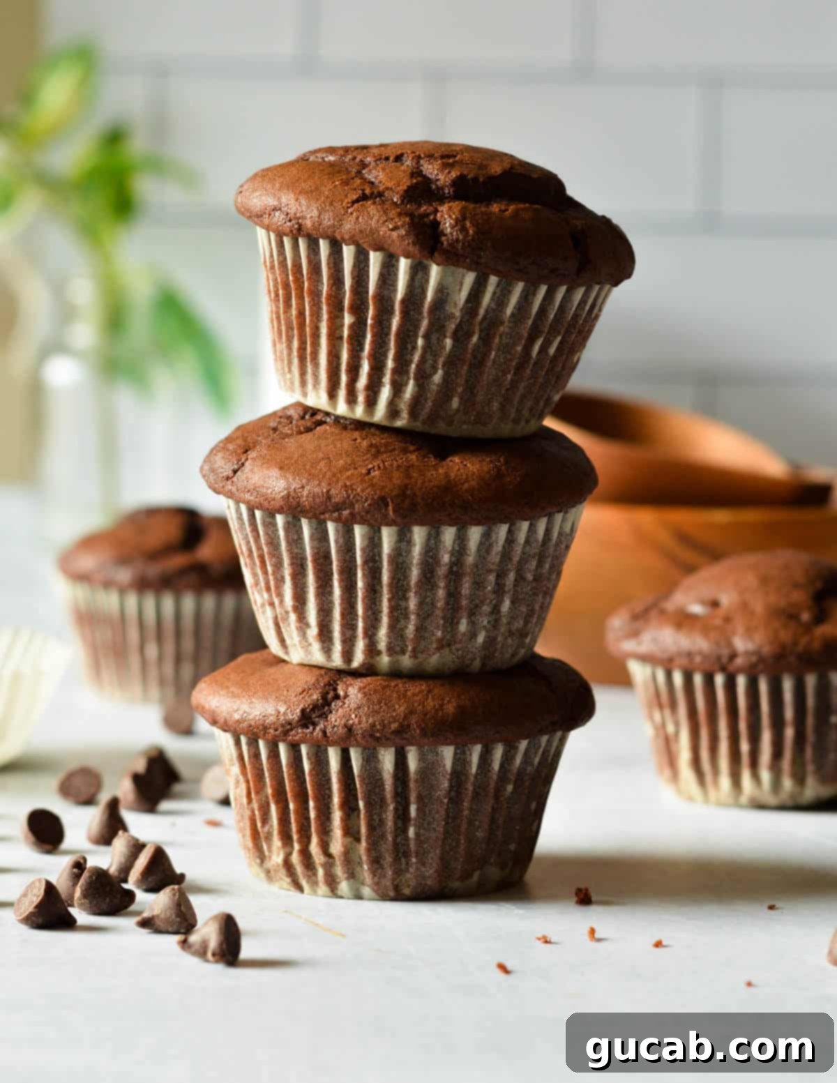 a stack of gluten free chocolate muffins.