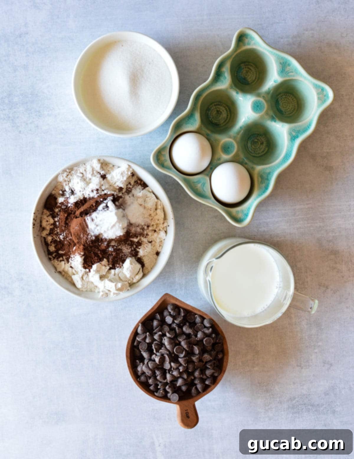 sugar, eggs, gluten free flour, cocoa powder, milk, chocolate chips. 