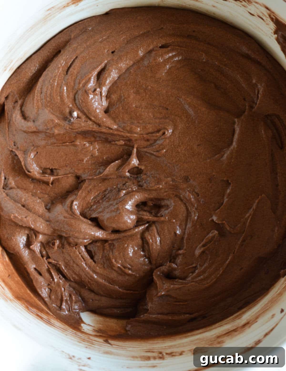 a bowl of gluten free chocolate muffin batter. 