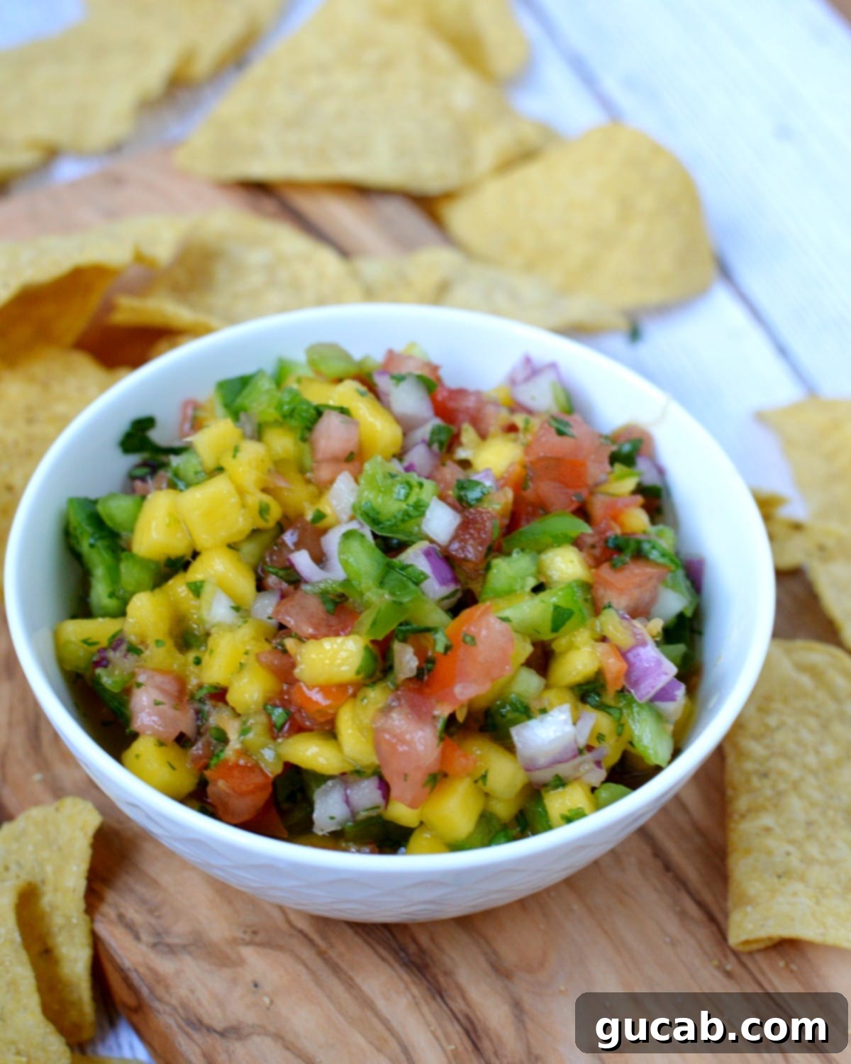 A bowl of vibrant mango habanero salsa ready to eat