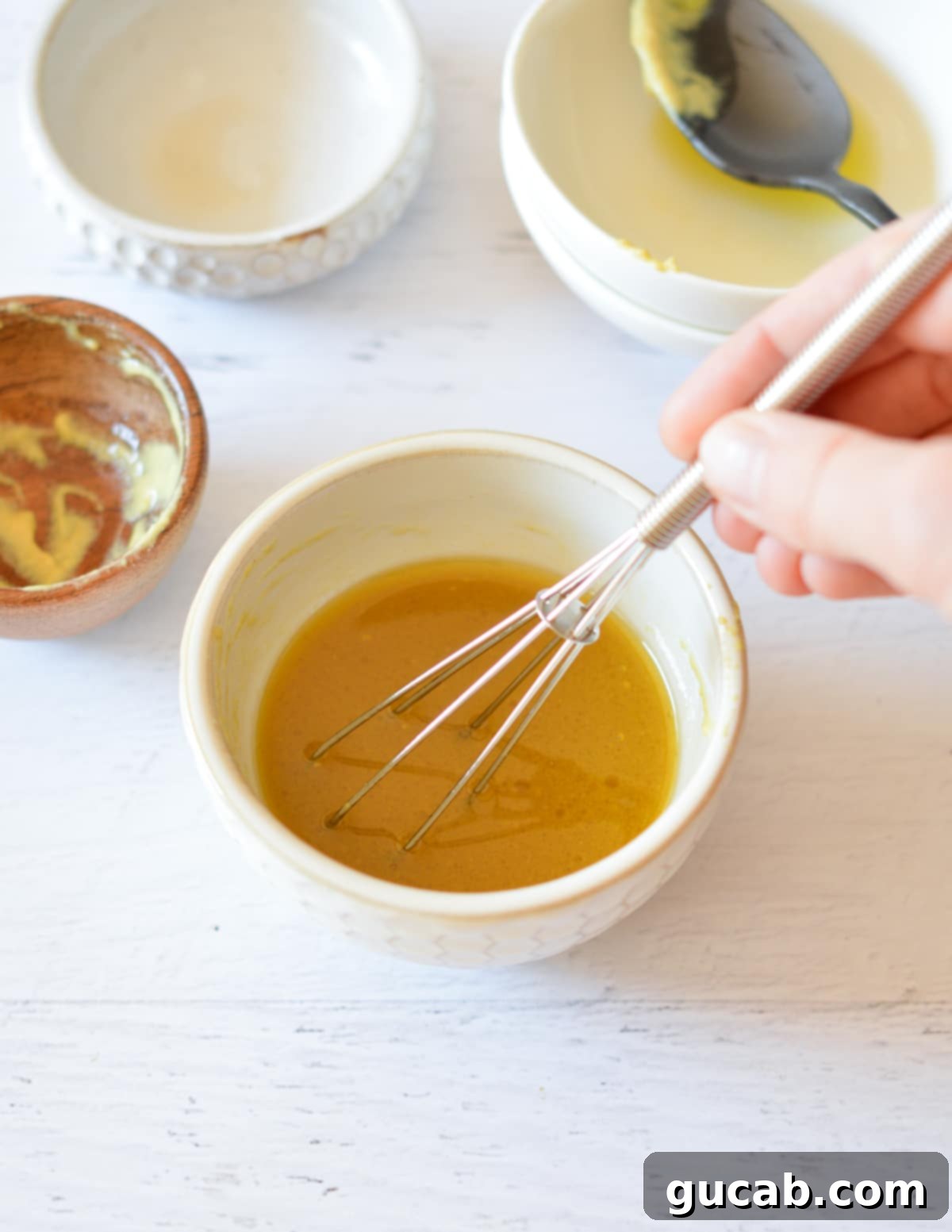 a bowl of maple dijon sauce. 