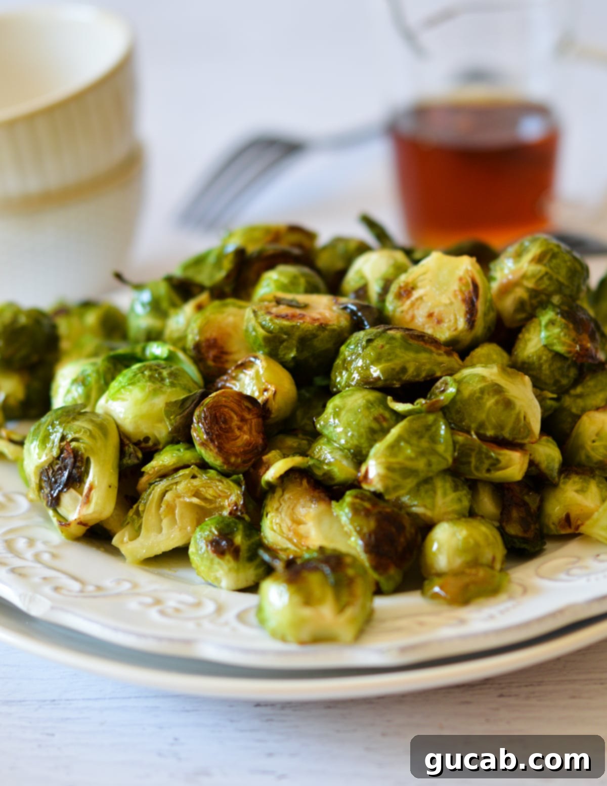 a plate of candied brussels sprouts. 