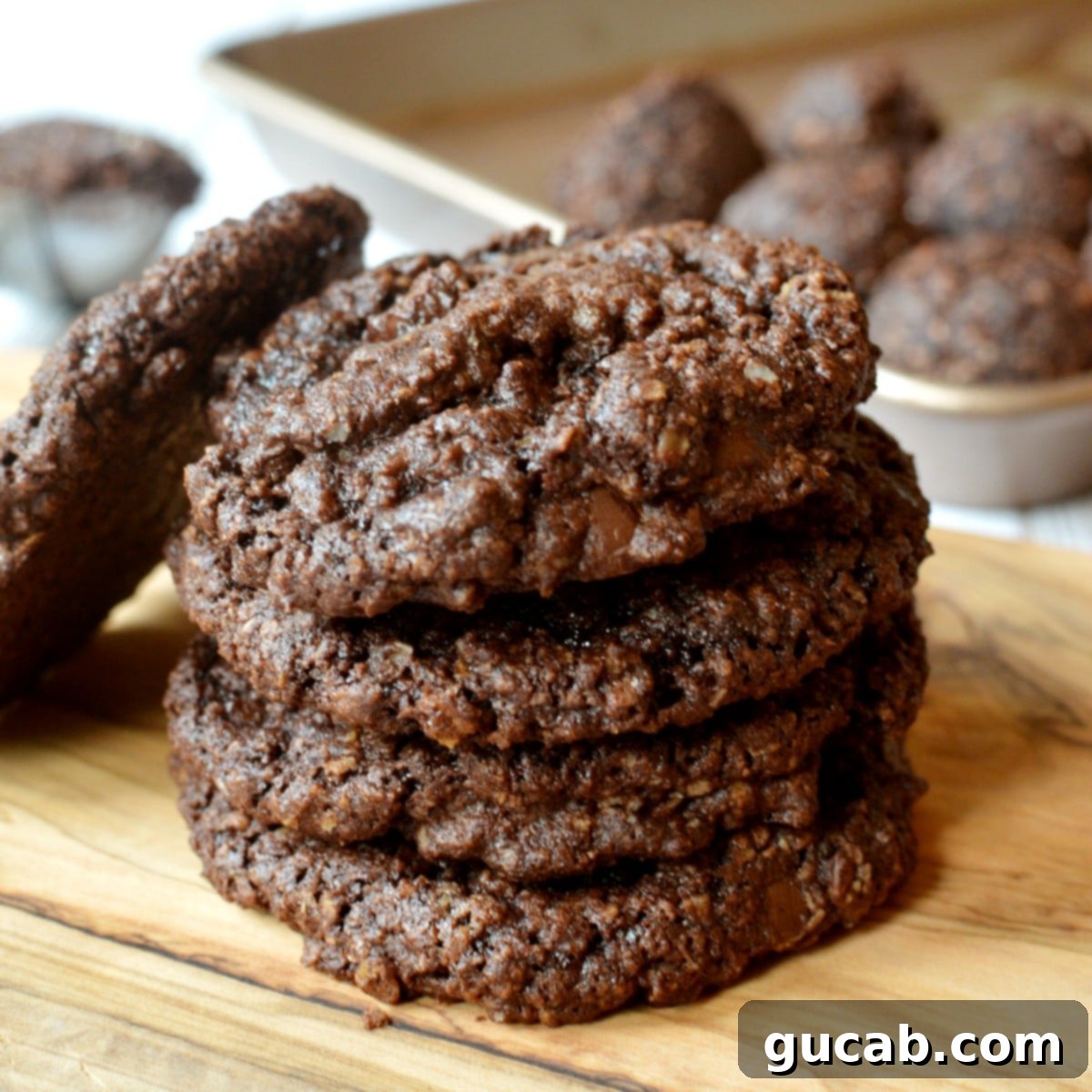 a stack of dark chocolate oatmeal cookies, ready to be enjoyed