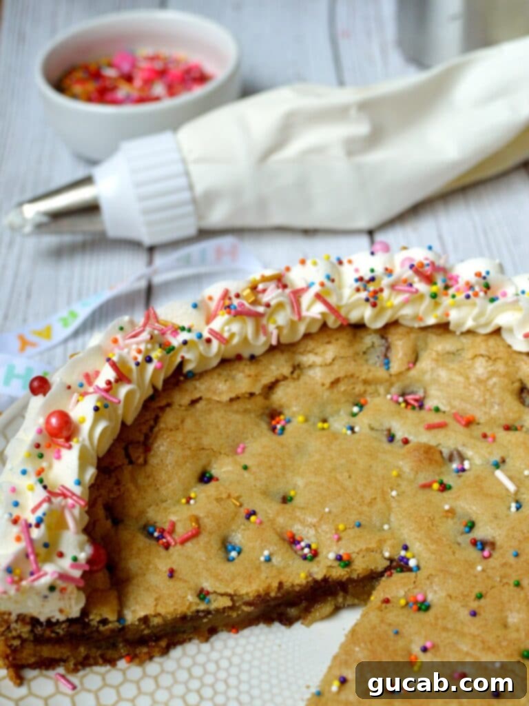 Ultimate Gluten-Free Cookie Cake 3 chocolate chip cookie cake with piped buttercream frosting