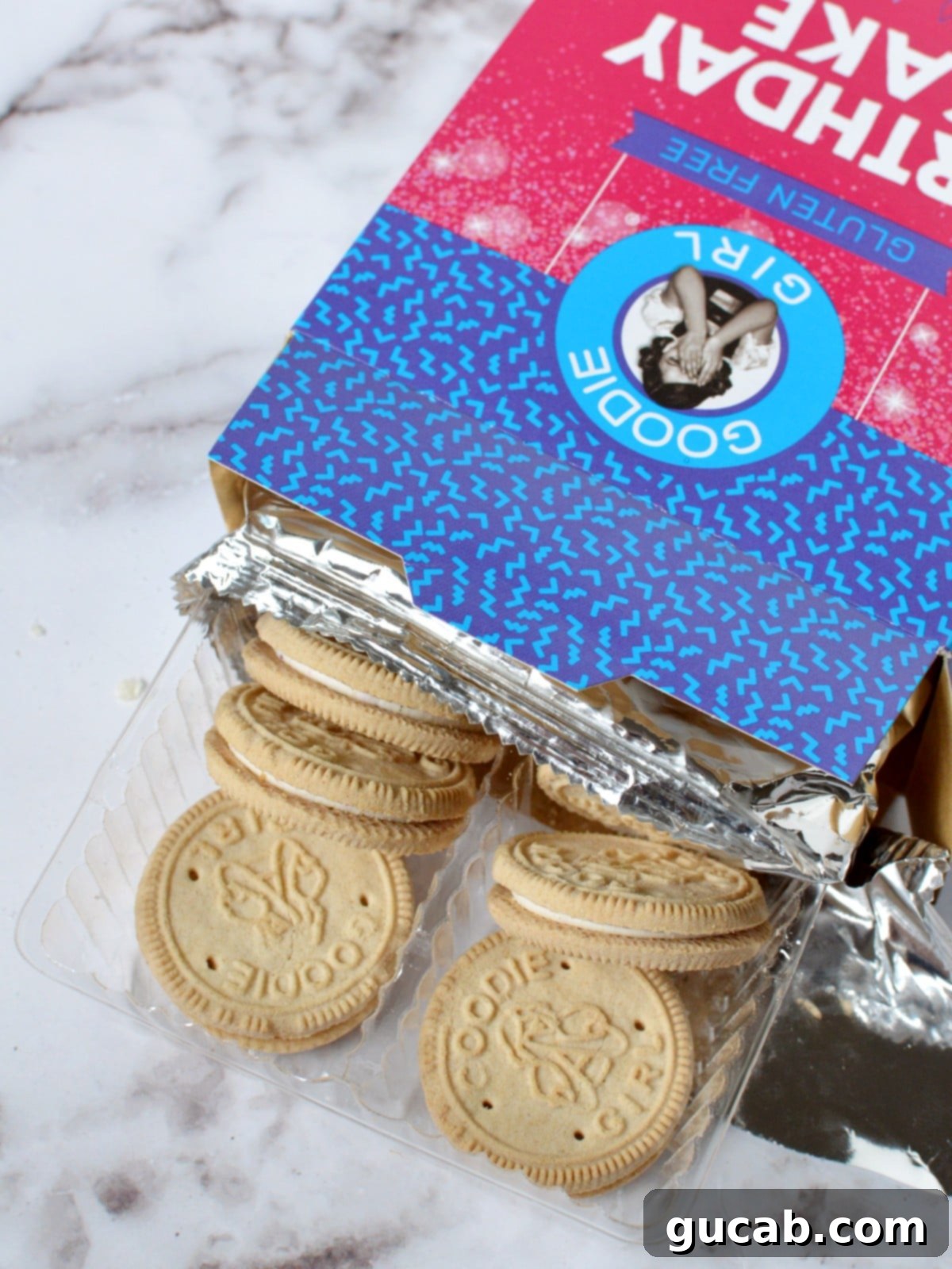 Goodie Girl Gluten Free Birthday Cake Sandwich Cookies, featuring colorful sprinkles and a creamy filling.