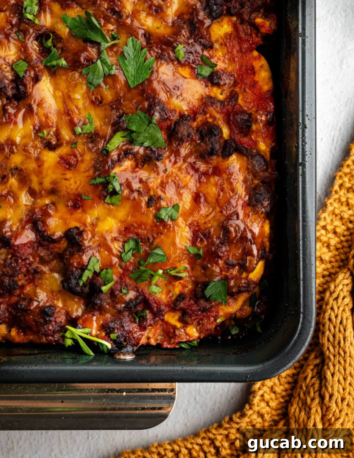 Gluten-Free No-Noodle Butternut Squash Lasagna 2 A golden brown, cheesy butternut squash lasagna baked to perfection in a glass baking dish, ready to be served.