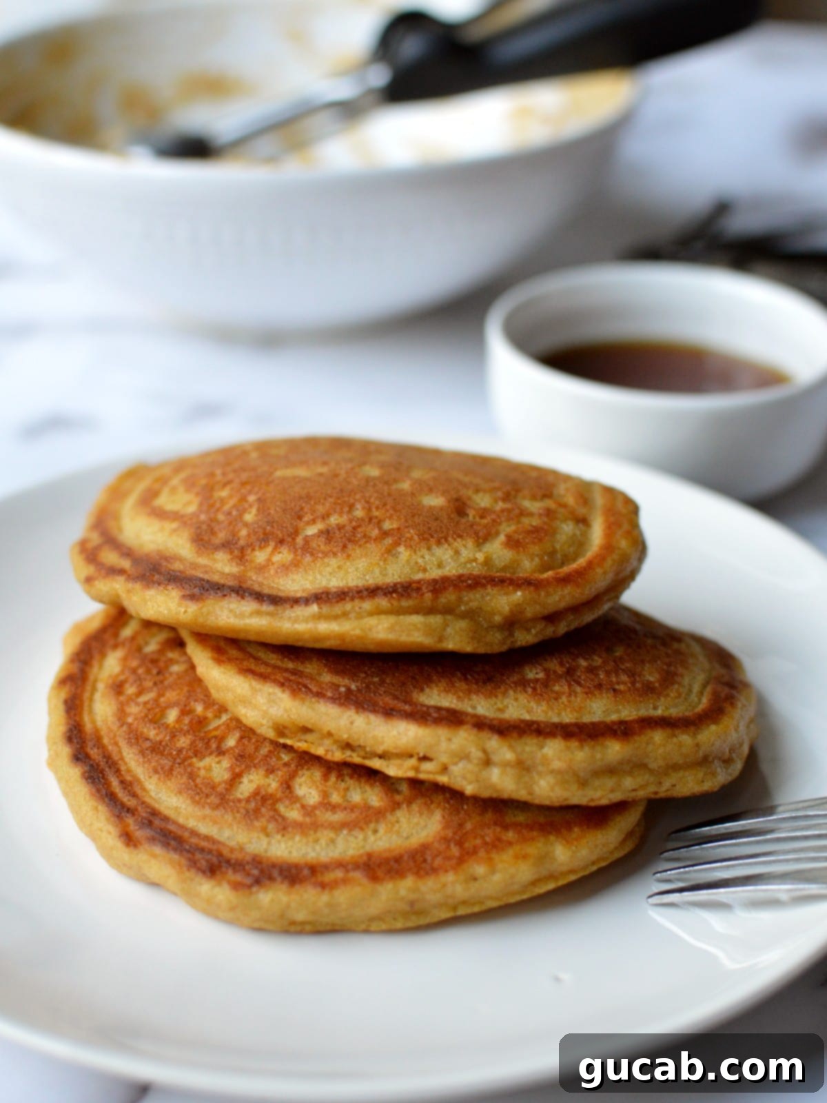 paleo sweet potato pancakes, golden brown and stacked