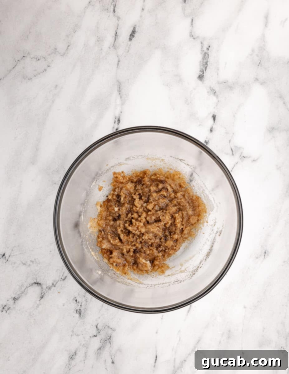 a bowl of mixed sugar and browned butter