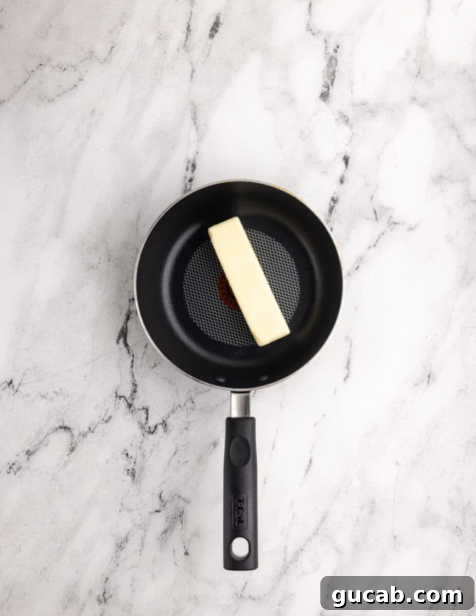 a stick of butter in a saucepan. 