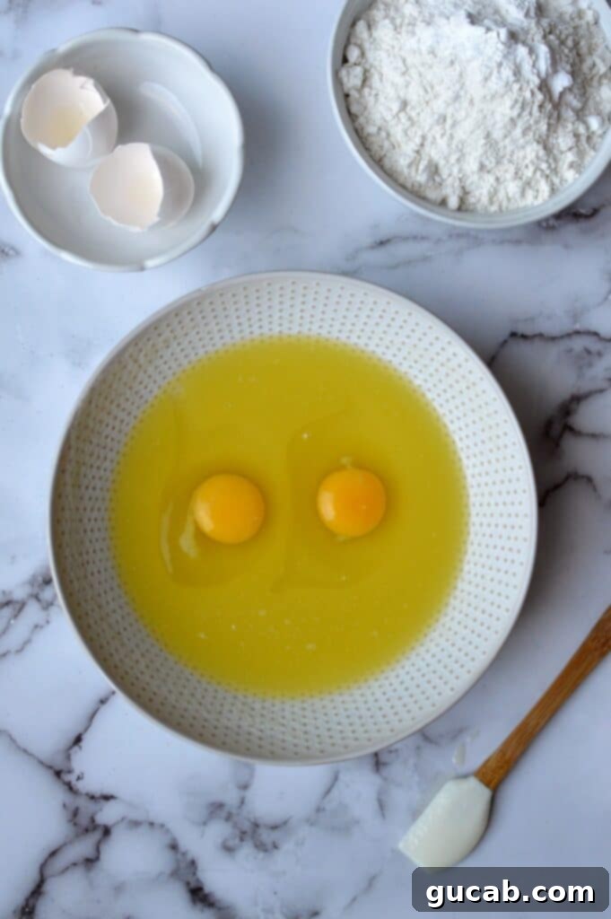 Exquisite Gluten-Free Pistachio Cake 4 Mixing oil, sugar, and eggs for gluten-free pistachio cake batter