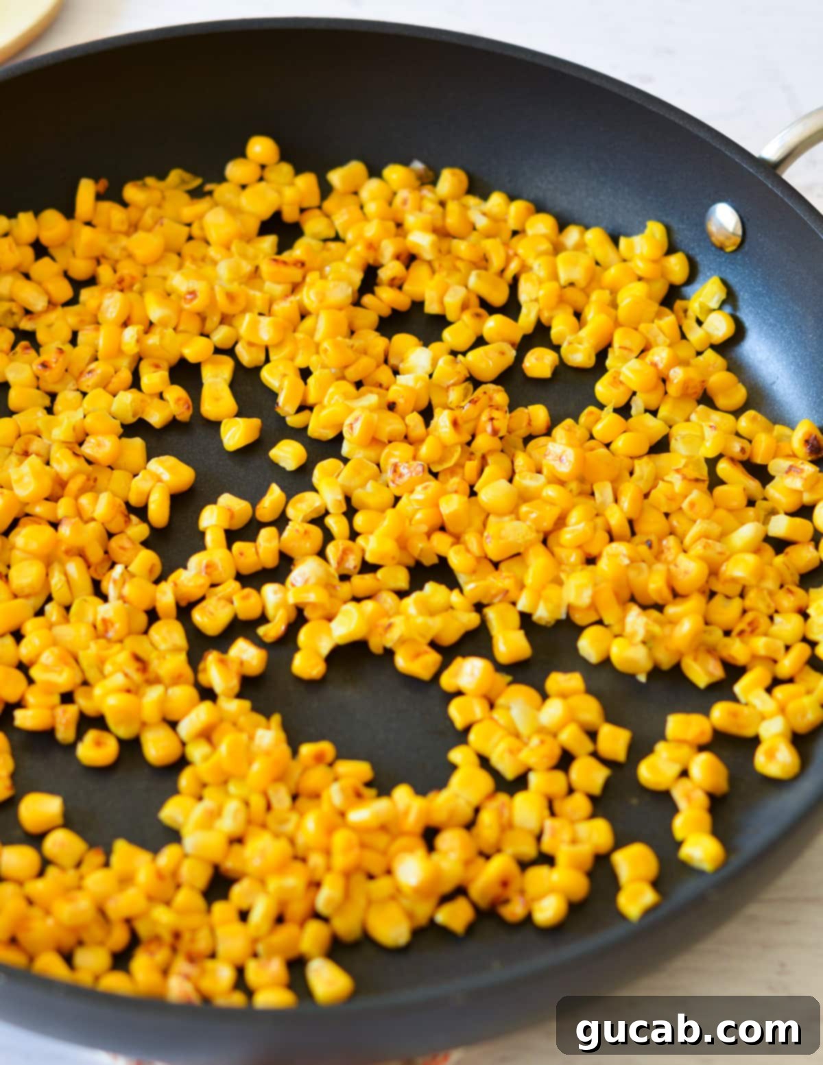 canned corn in a skillet.