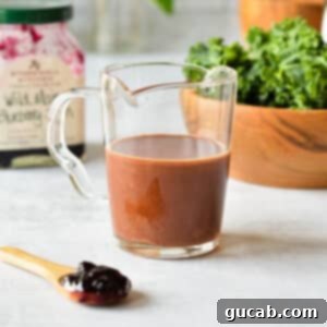 a cup of balsamic dressing