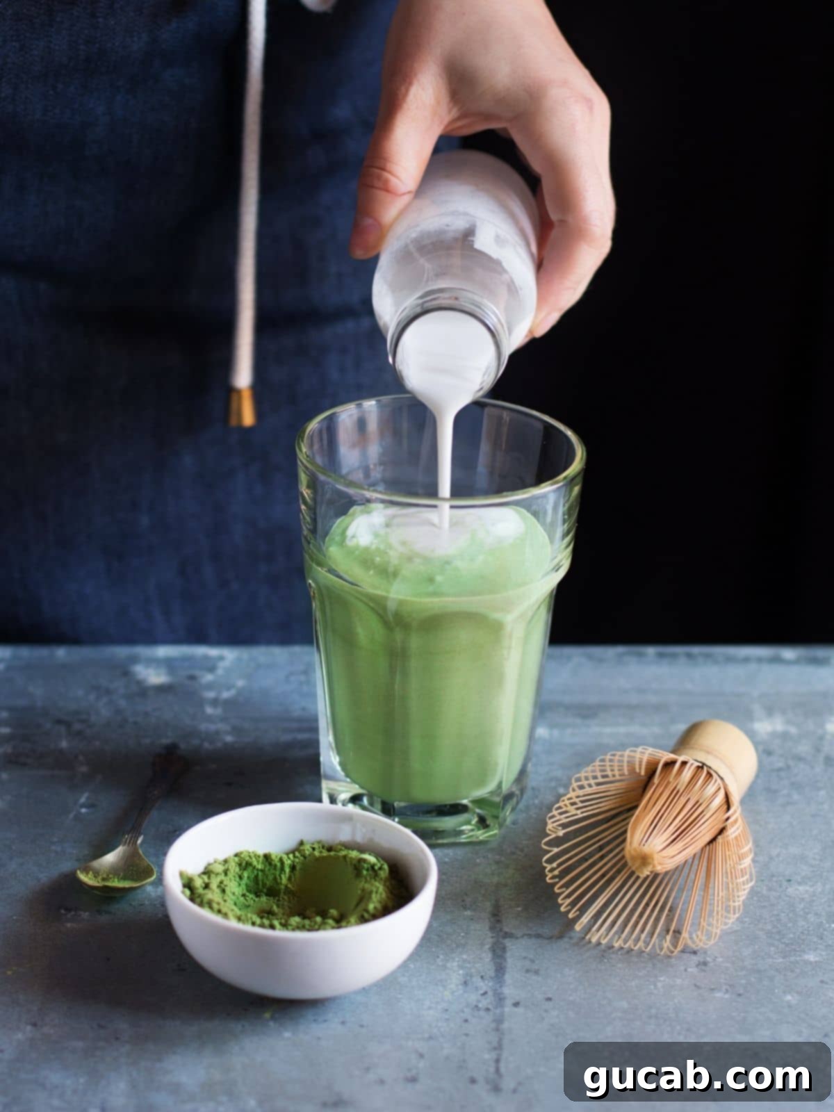 A beautifully prepared matcha latte, showcasing the vibrant green color of matcha.