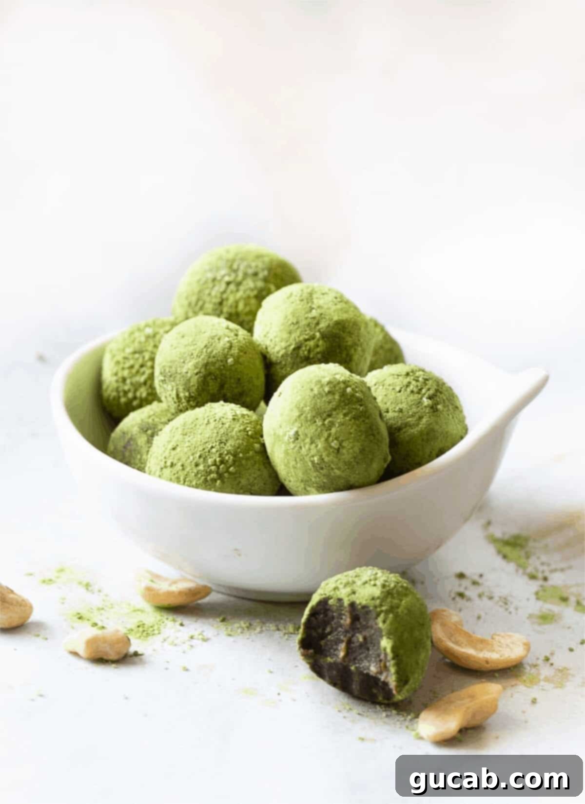A close-up of matcha energy balls, showing their vibrant green color and wholesome texture.