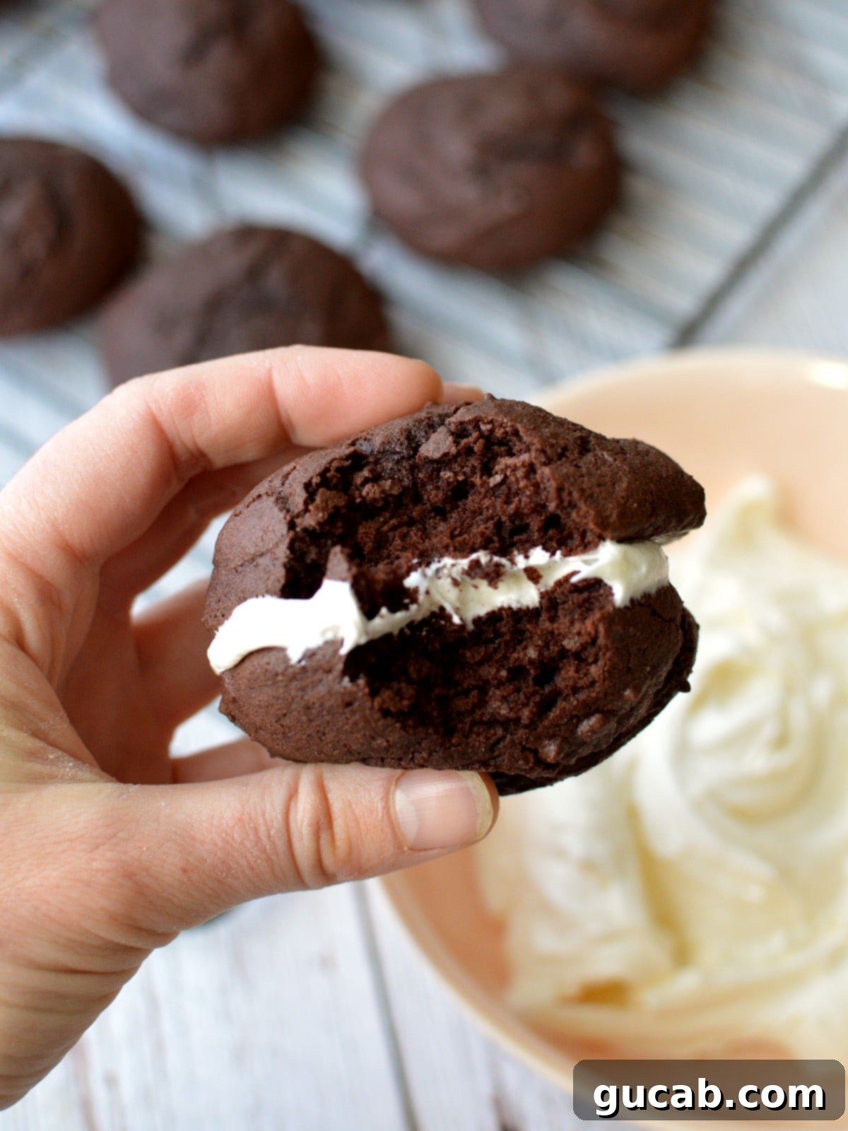 hand holding a gluten-free chocolate whoopie pie
