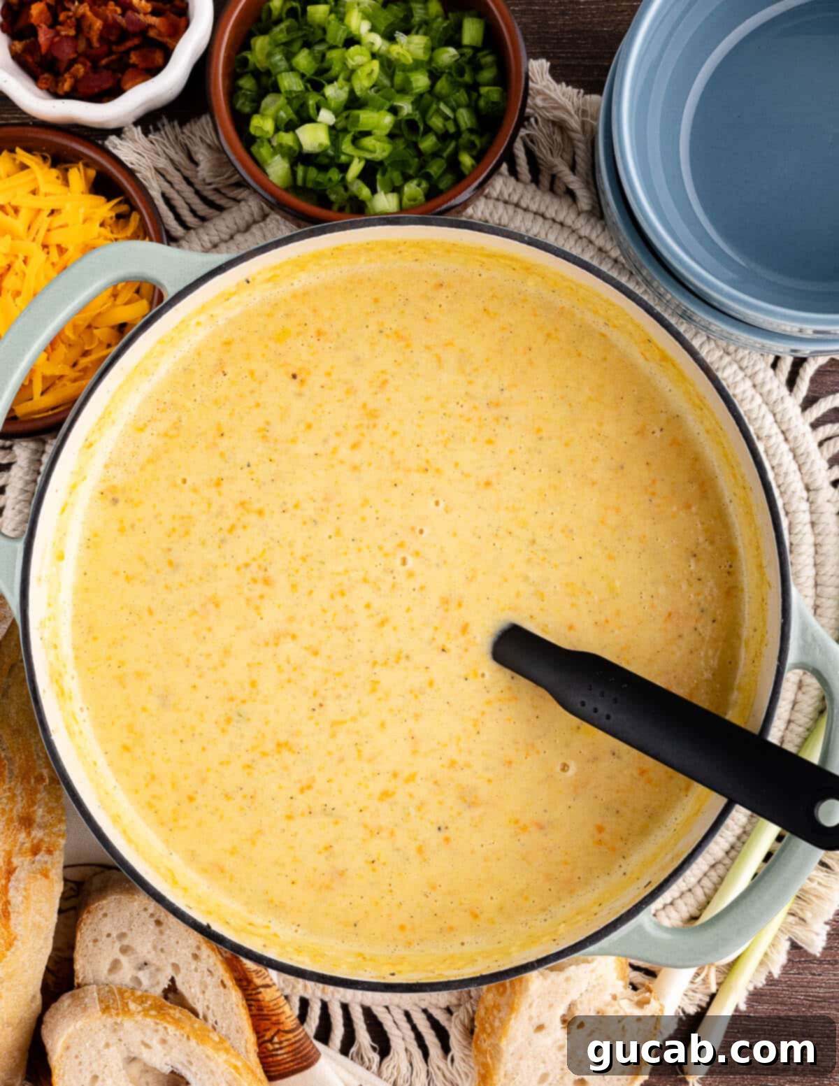 a dutch oven full of gluten-free potato soup
