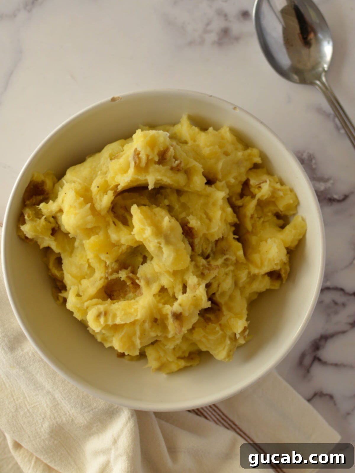 Creamy Almond Mashed Potatoes 7 a bowl of vegan mashed potatoes
