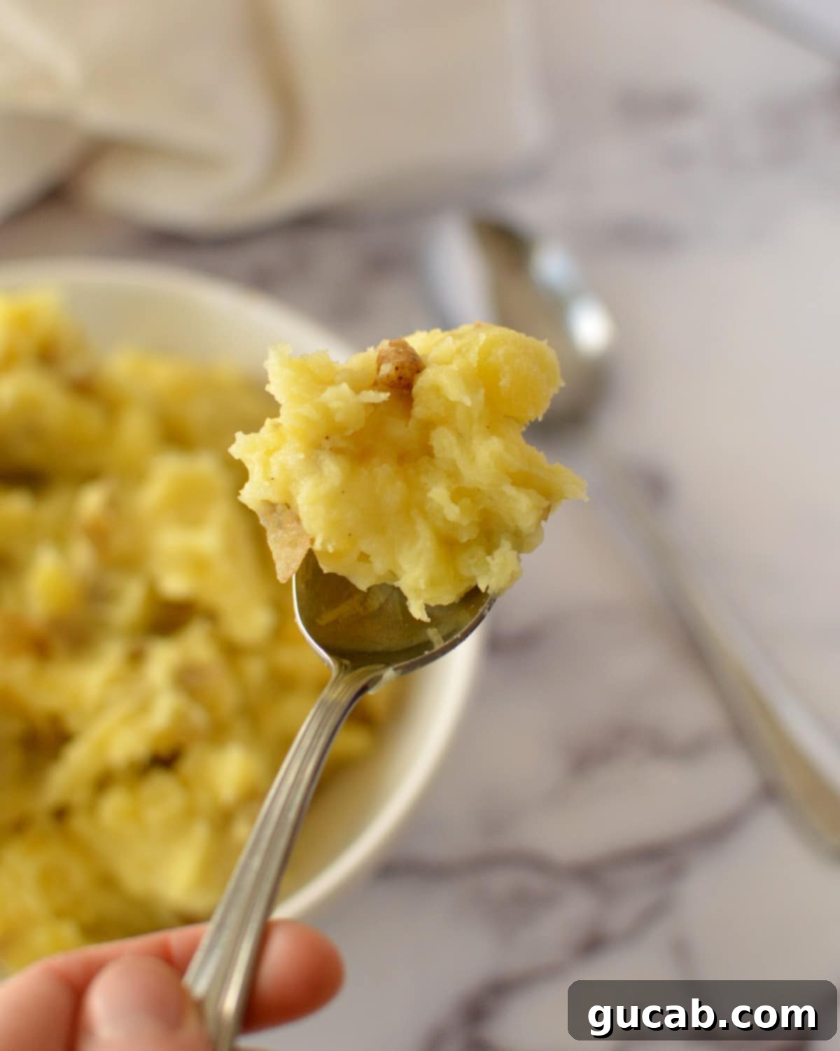 Creamy Almond Mashed Potatoes 8 a bite of mashed potatoes