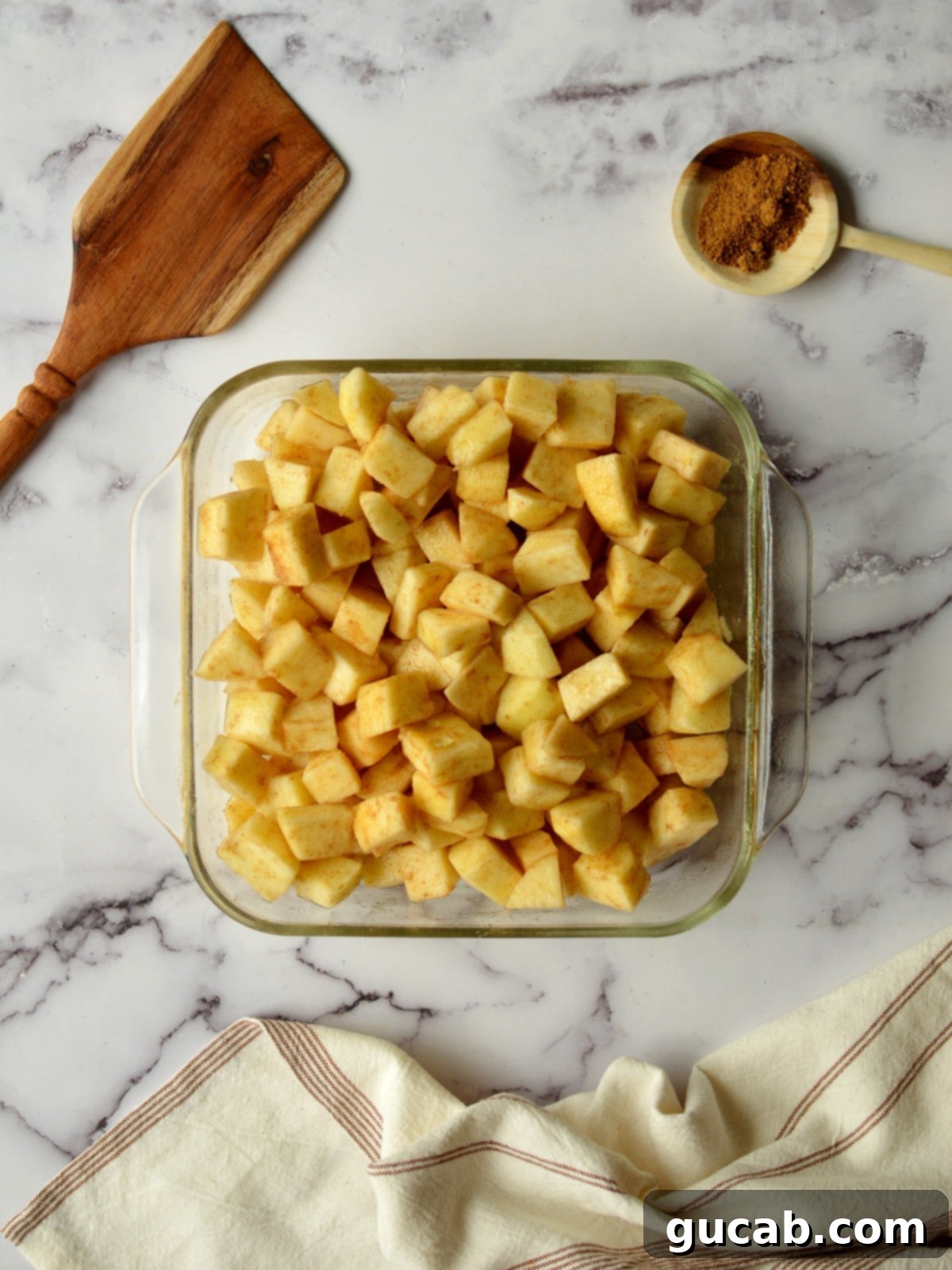 Wholesome Apple Crumble 6 a baking dish with apples