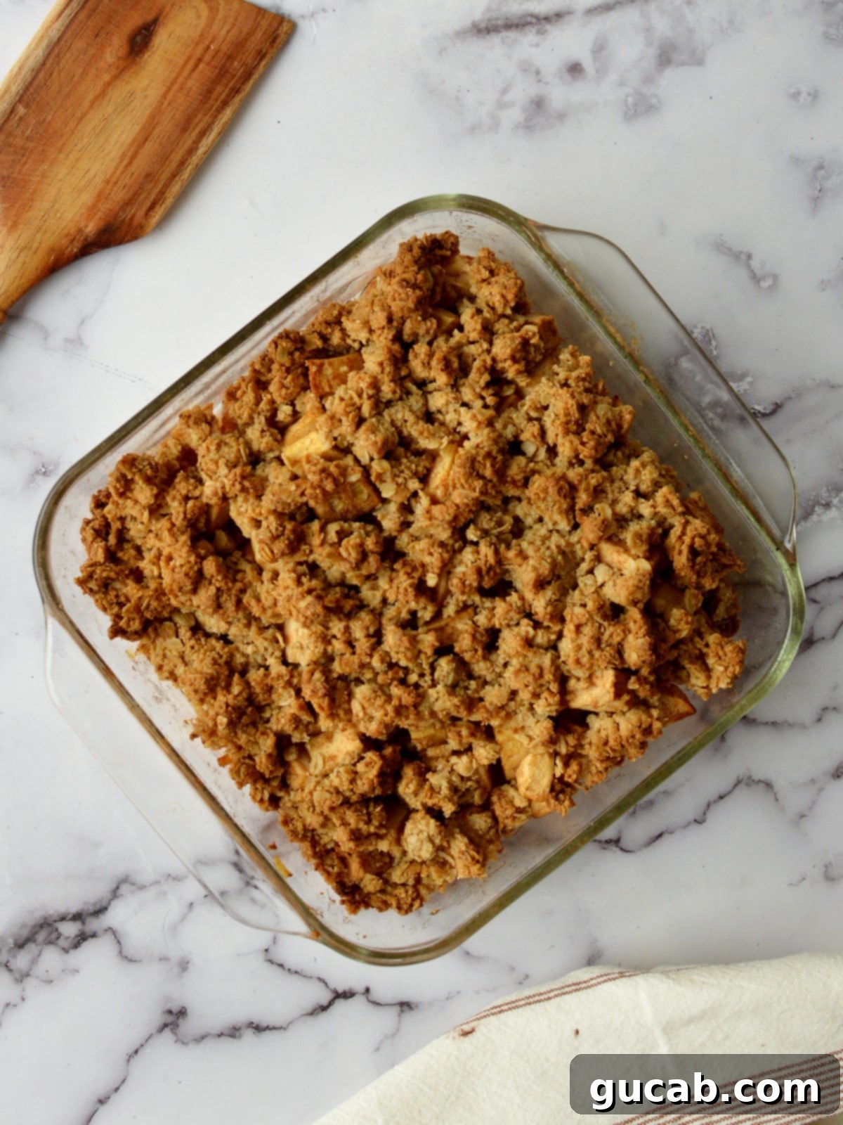 Wholesome Apple Crumble 9 a baked apple crumble in a baking dish