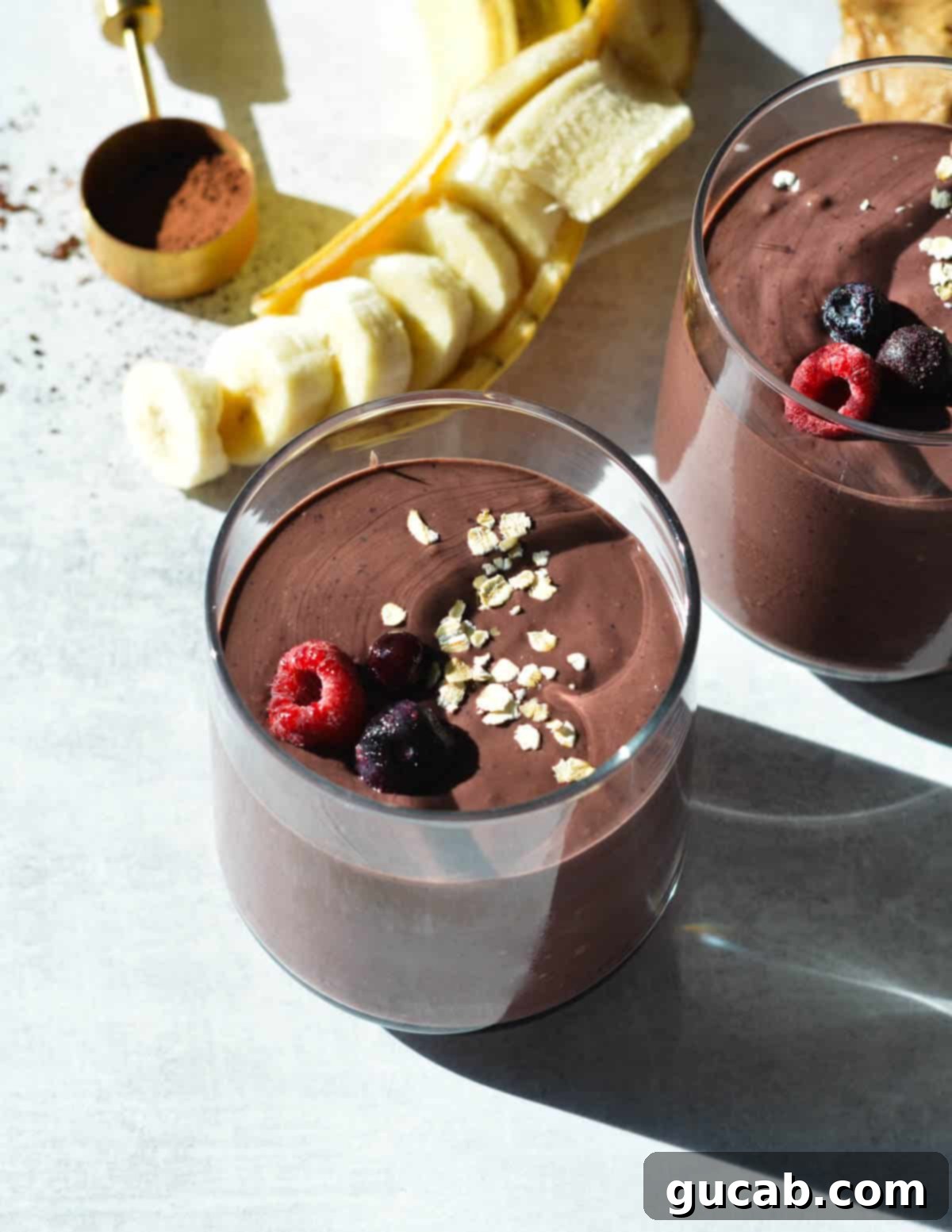 Chocolate Berry Bliss 7 chocolate berry smoothie with oats and berries on top.