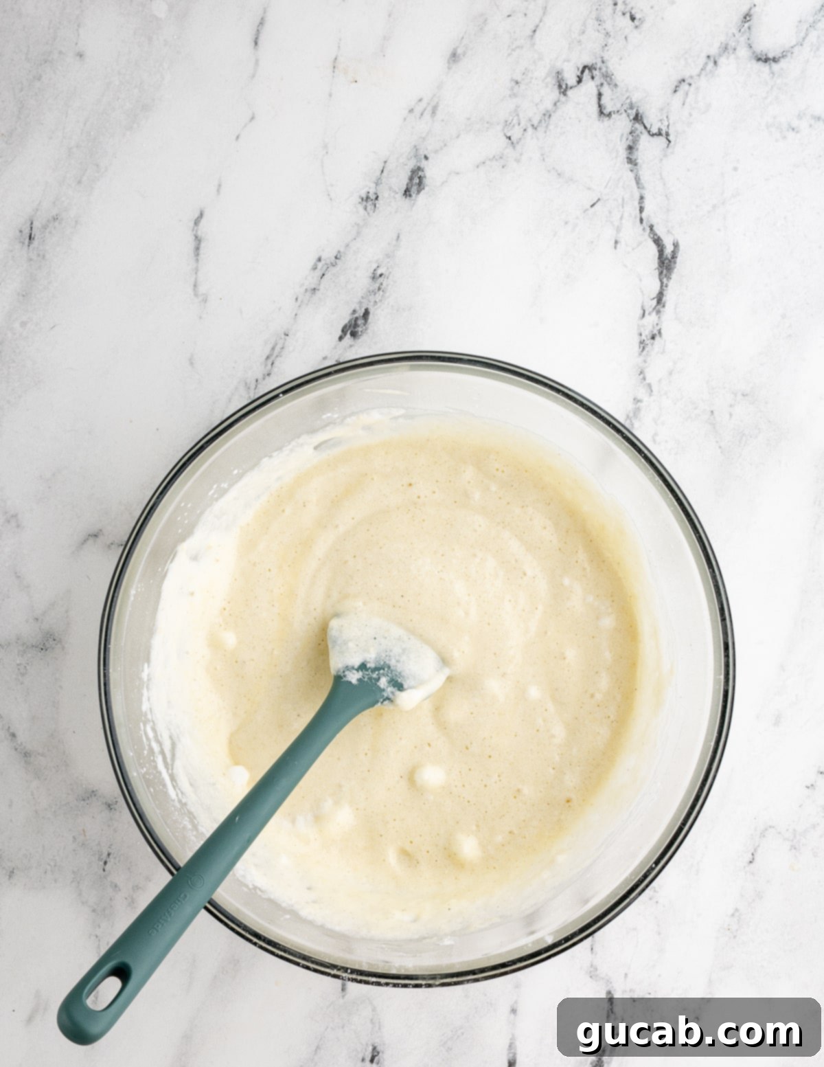 Your New Favorite Gluten-Free Waffle Recipe 12 A bowl of light and airy gluten-free waffle batter, perfectly mixed and ready for the waffle iron.