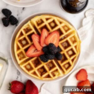 Your New Favorite Gluten-Free Waffle Recipe 17 a waffle with strawberries and blackberries on top.