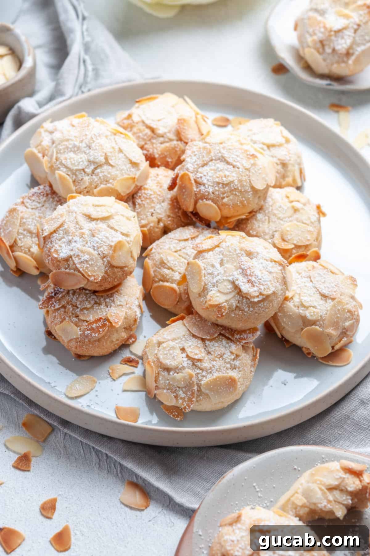 a plate of vegan almond cookies, a simple and delicious egg-free, dairy-free, gluten-free dessert