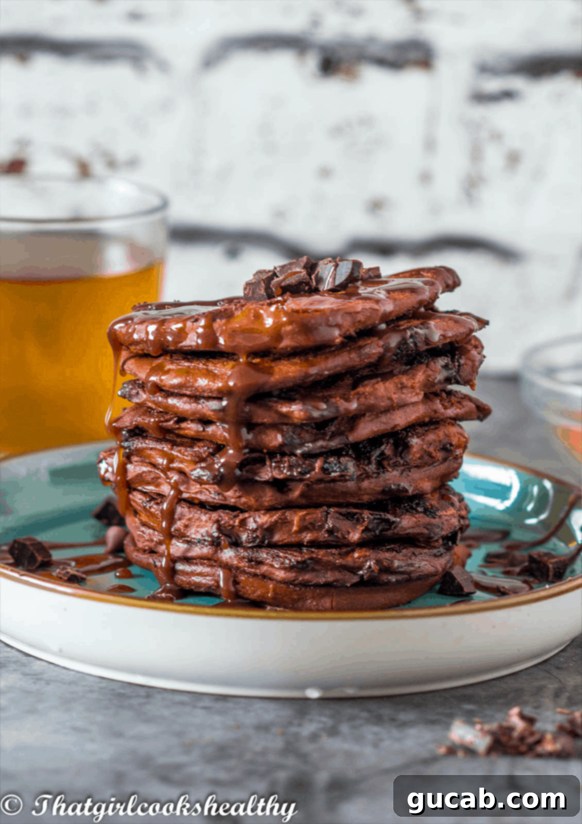 a stack of chocolate chip pancakes, a decadent vegan, gluten-free, egg-free breakfast