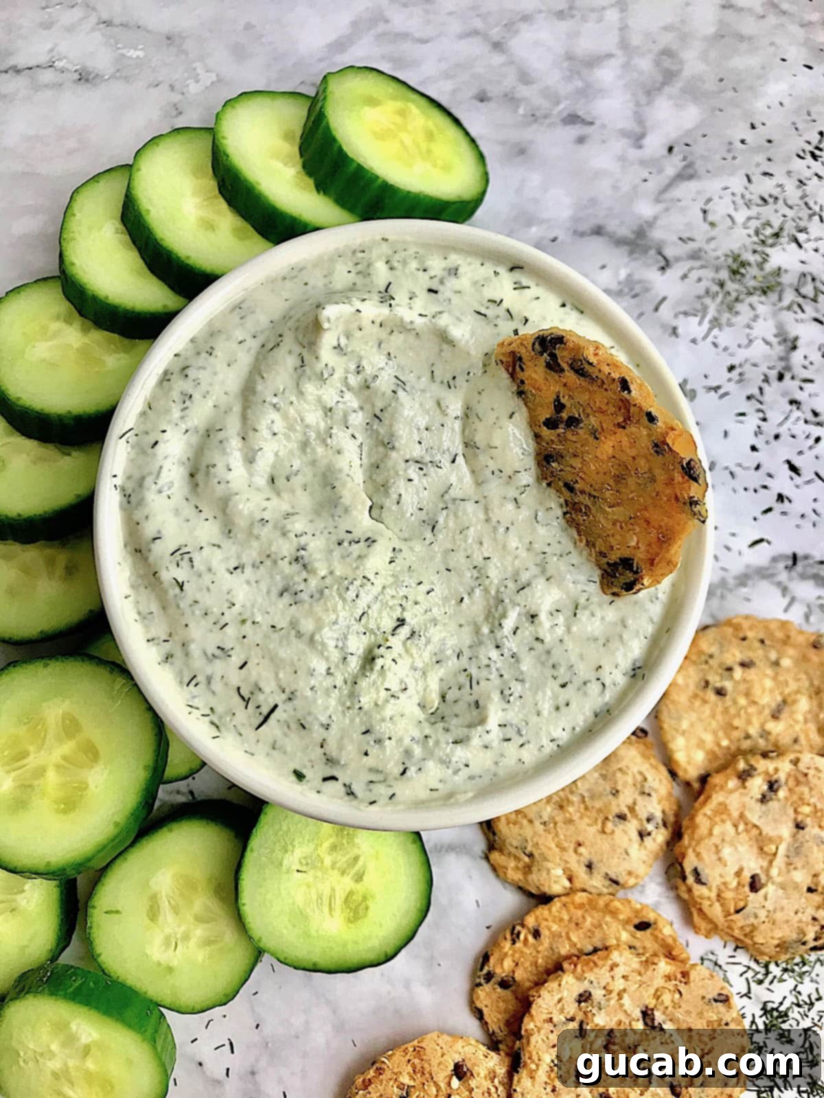 a bowl of vegan tzatziki