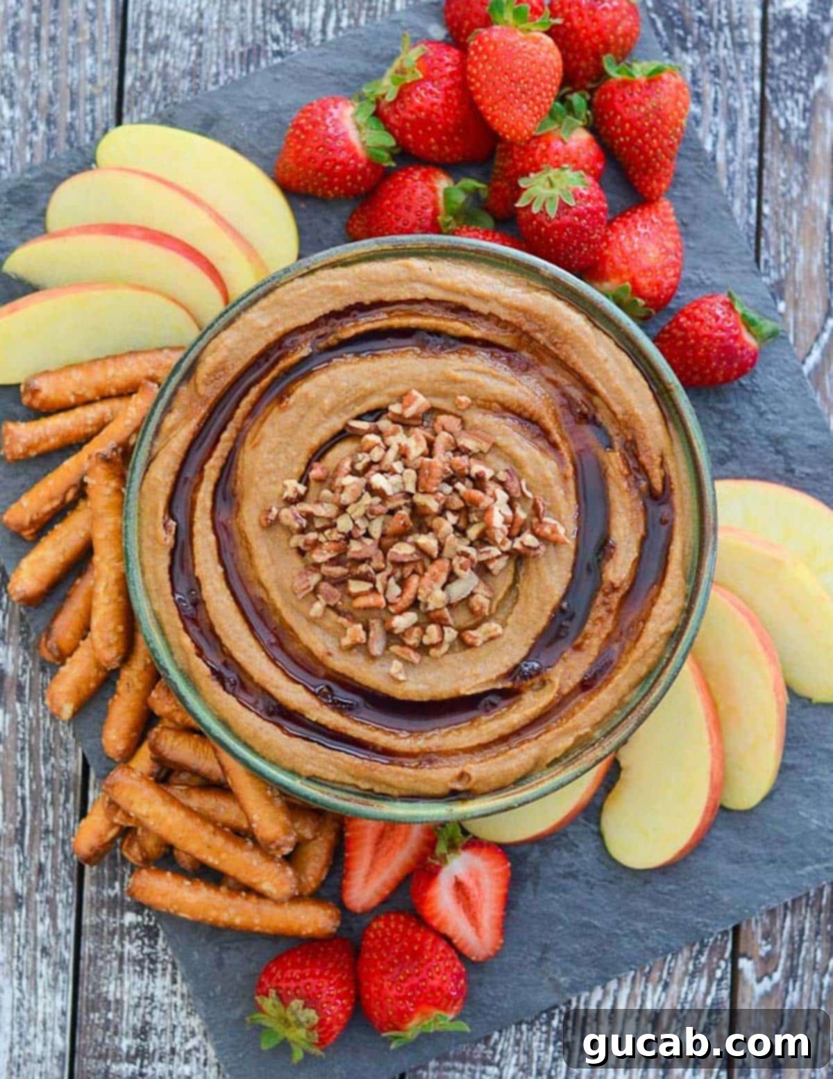 snickerdoodle hummus with pecans on top