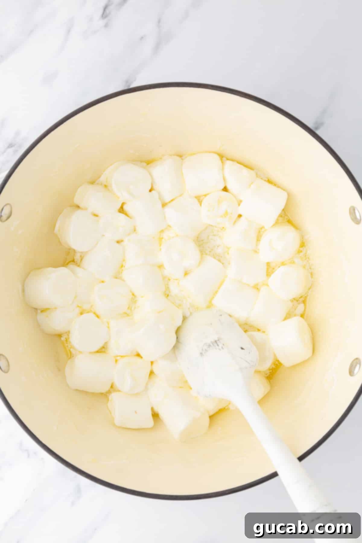 Melted butter and marshmallows in a Dutch oven
