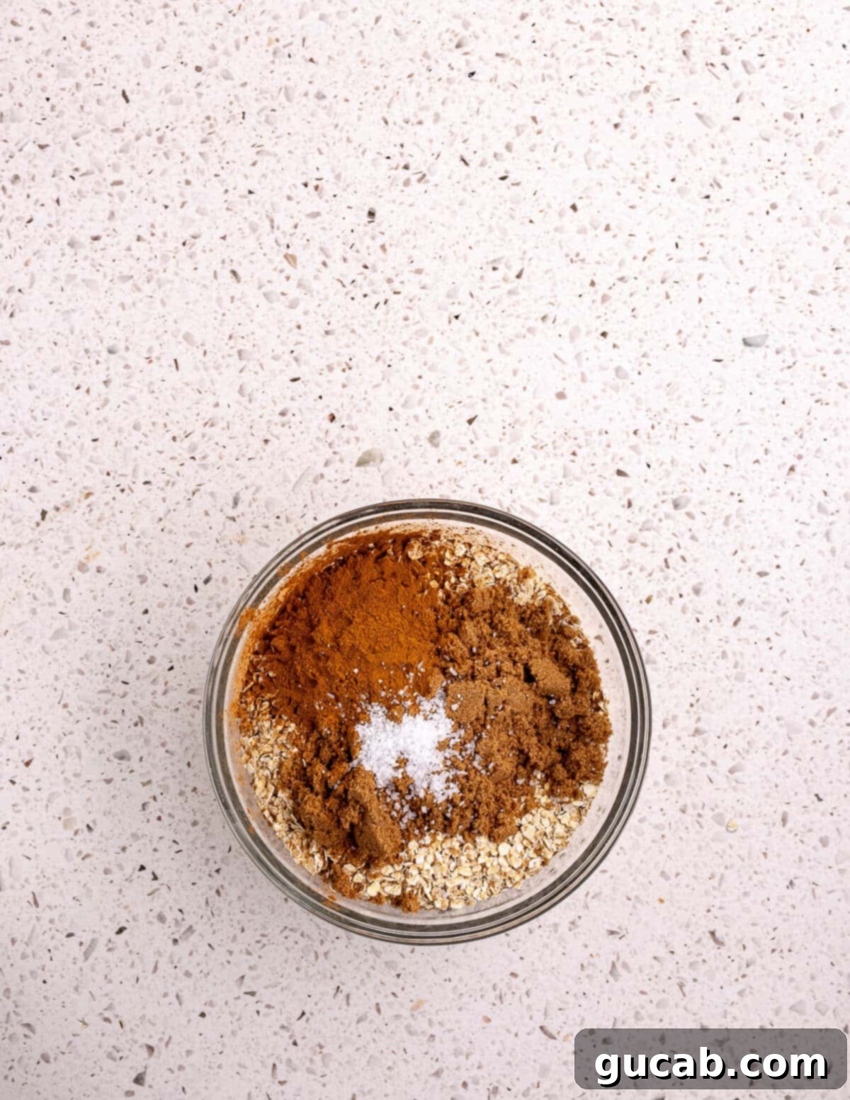 DIY Quick Oats Pouches 5 Mixing instant oatmeal ingredients in a bowl